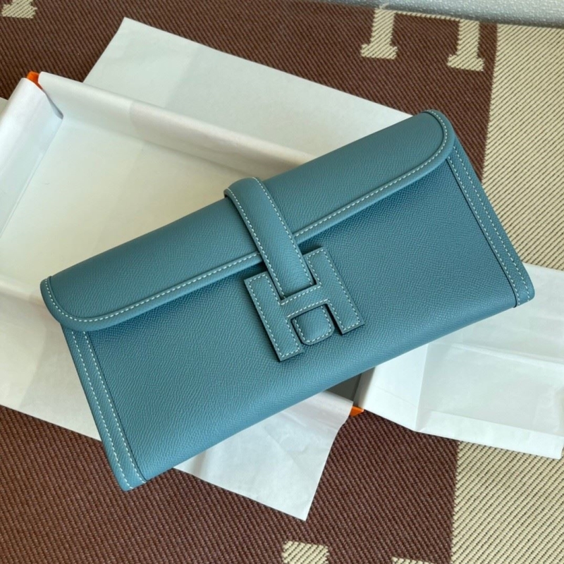 H**mes clutch bags